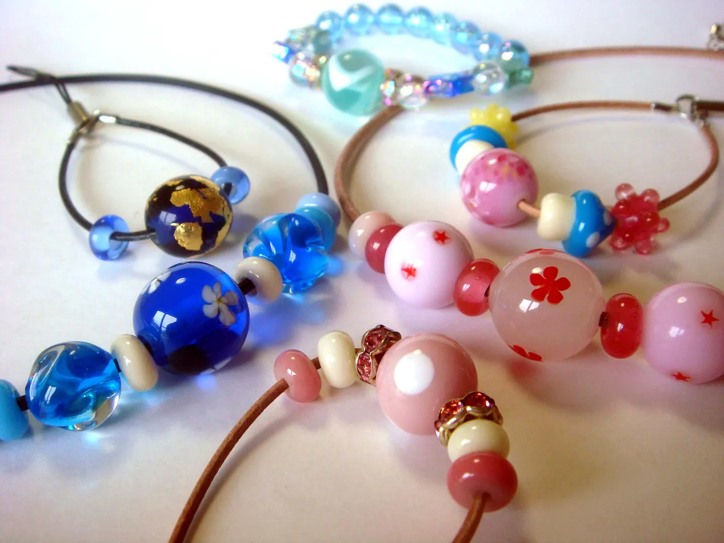 Jewelry using spun glass beads
